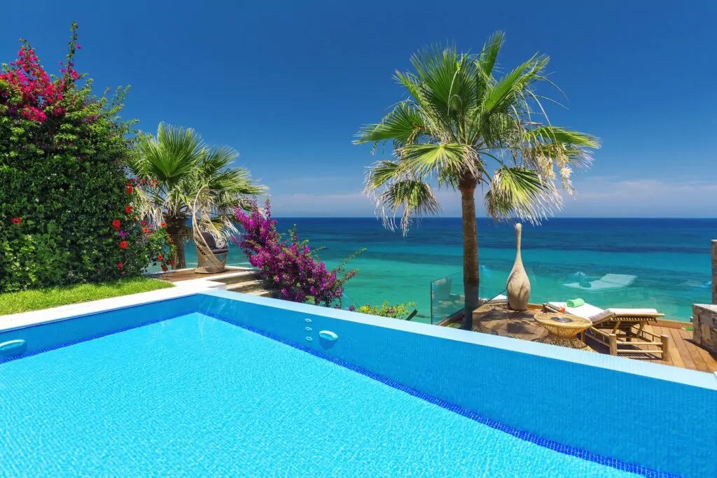 Four-bedroom private ultra luxury family villa Greece with sea views THE GRAND RESIDENCE with 2 private heated pools and private beach Porto Zante Villas & Spa Zakynthos Island